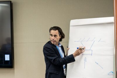 Energy-absorbing systems for securing floating structures